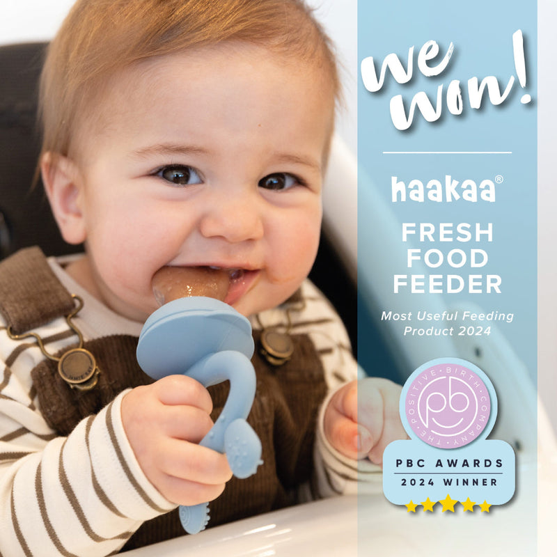 PBC 2024 Awards - Photo of baby using Haakaa's award-winning Fresh Food Feeder, winner of the 2024 Most Useful Feeding Product category (Positive Birth Company) 