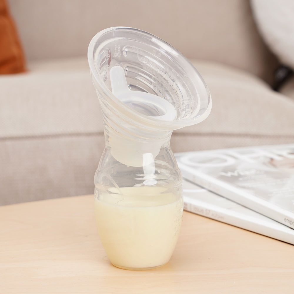 Gen. 1+ Silicone Manual Breast Pump + SpillGuard Insert.